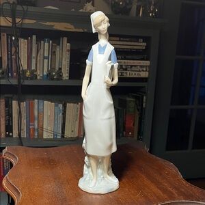 Lladro Porcelain Nurse Sculpture in White and Blue